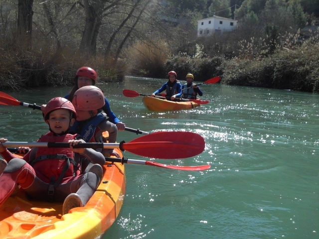  Little ones in the canoe in front of the adults 